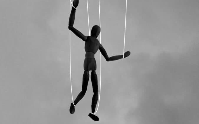 2 men playing basketball in grayscale photography