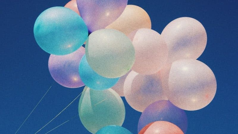 white, blue, and purple balloons